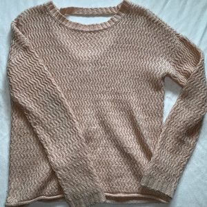 dim pink sweater with triangle back cutout detail